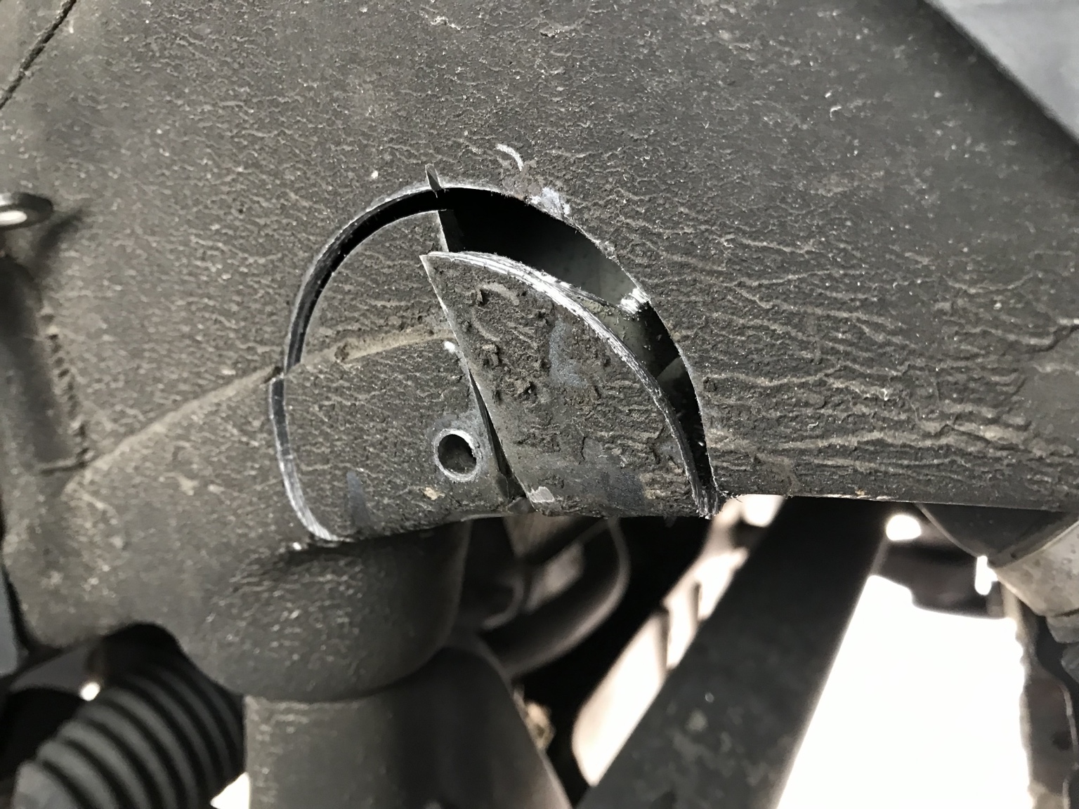 Frame notch in progress showing the cutout for axle clearance
